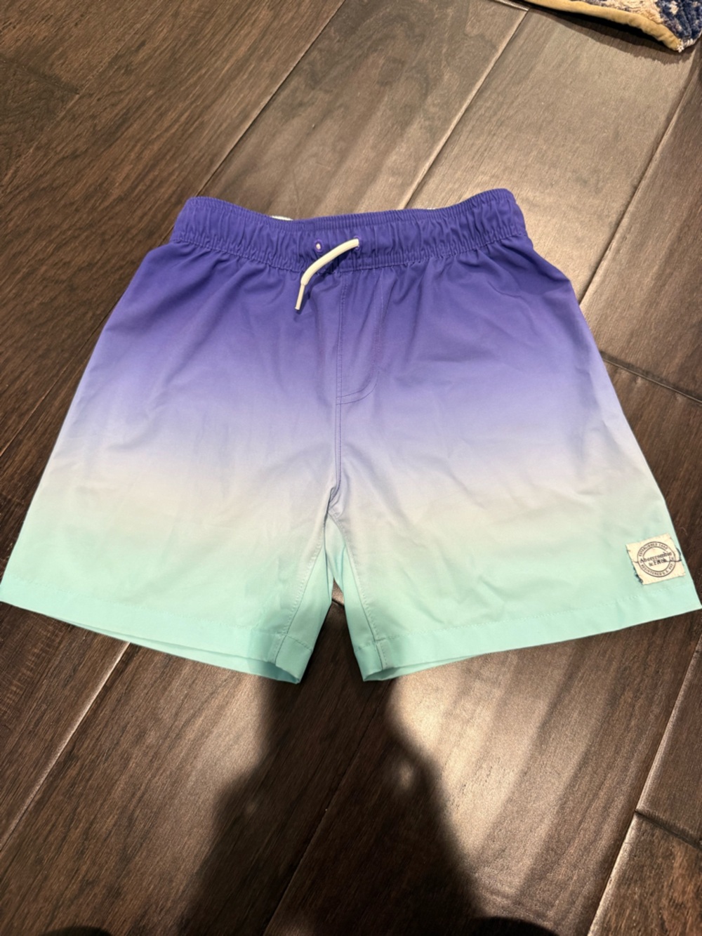 abercrombie kids White Mesh Lined Swim Shorts with Blue Trim